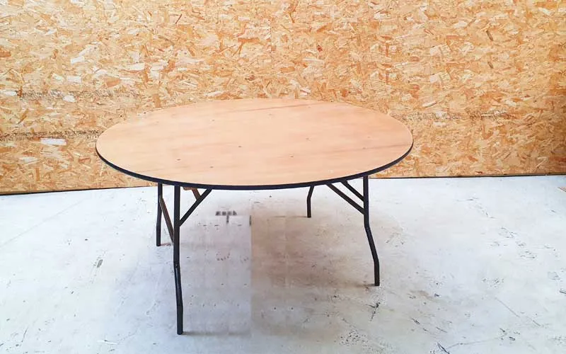 Five foot round table dressed for a wedding breakfast