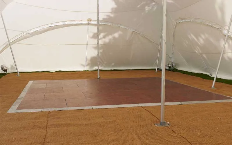 Wooden parquet dance floor inside a marquee