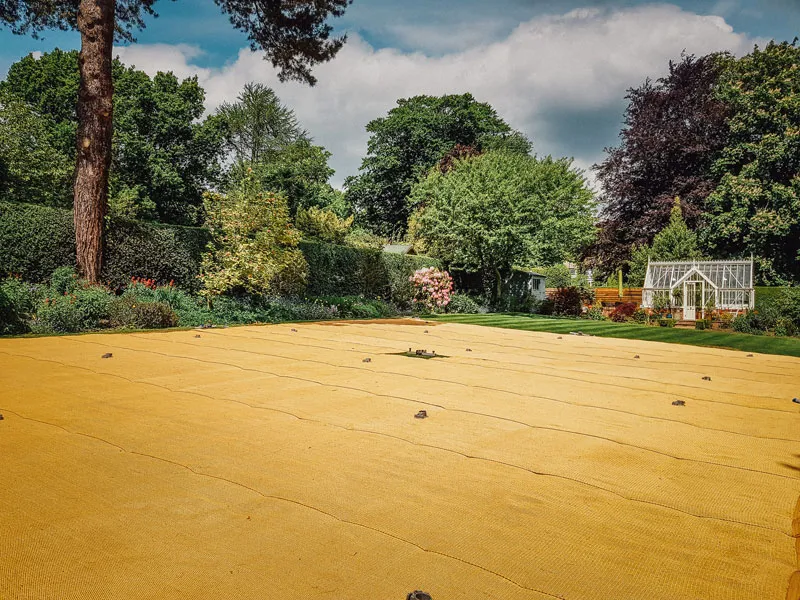 Coconut matting going down inside a marquee
