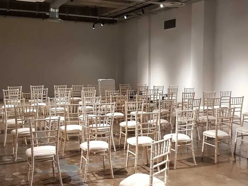 Limewash chiavari chairs set out at Kommune in Sheffield