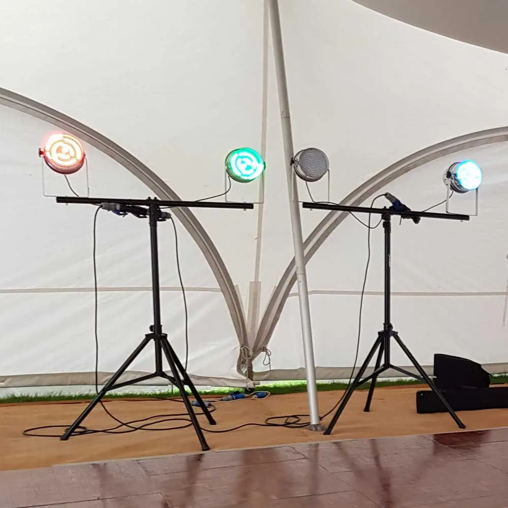 LED uplight on a stand inside a marquee
