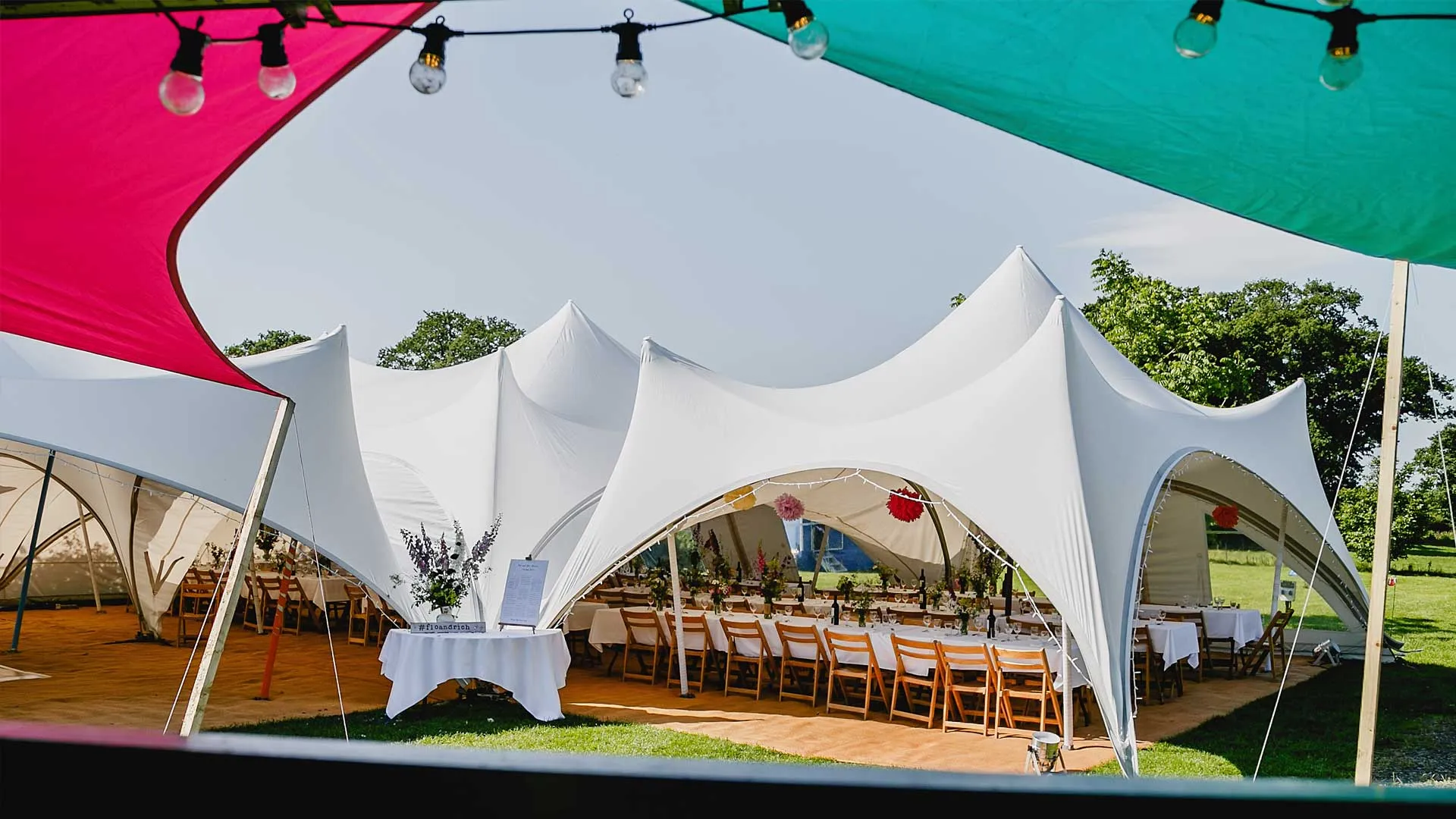 Trapeze marquee exterior at a wedding in Cheshire