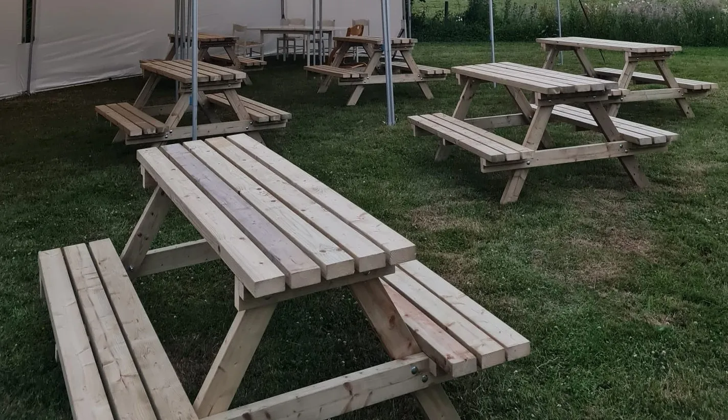 Solid wooden picnic benches